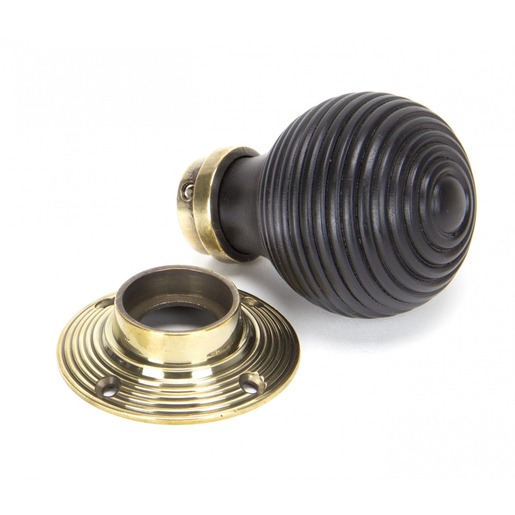 From the Anvil Ebony Mortice/Rim Beehive Knob Set - Aged Brass